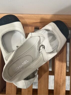 CHANEL White Leather Mary Jane Flats with Black Cap Toe and Strap